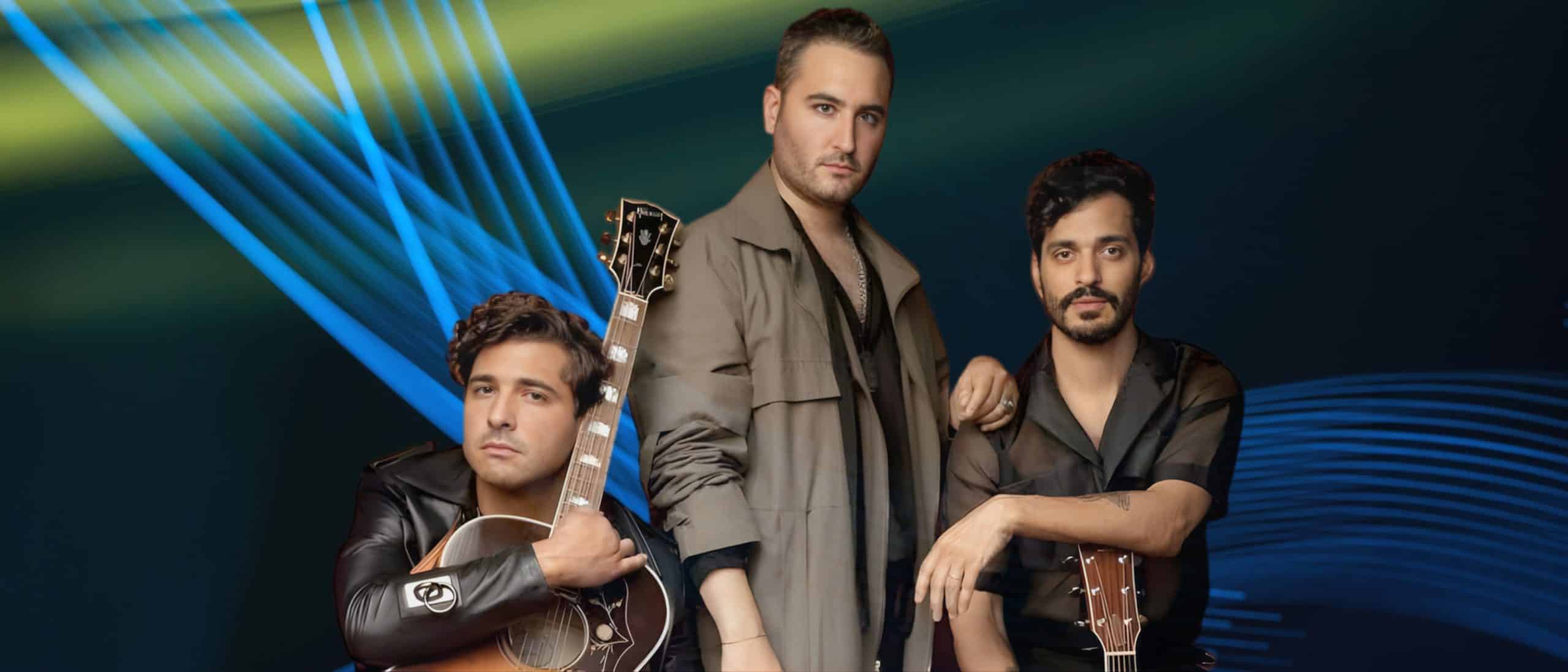 Reik posando con guitarras en sesión promocional con iluminación moderna, imagen del grupo ideal para contratar a Reik para conciertos y eventos en vivo